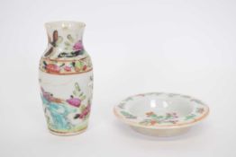 Small Chinese porcelain vase with a polychrome design and small Chinese porcelain saucer (2)