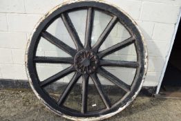 Large 12-spoke iron mounted cartwheel, the divisions between each spoke with later inset glazing,
