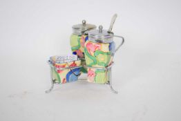 Clarice Cliff condiment set comprising mustard pot, salt and pepper, all decorated in the Chintz