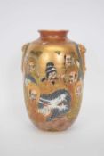 Japanese Satsuma vase, the ovoid body decorated with sages and gold signature to base, 19cm high