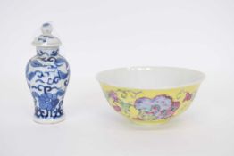 Chinese porcelain bowl, the yellow ground with polychrome design of dragons and butterflies together