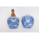 Two Chinese porcelain ginger jars, the blue ground with prunus decoration, one jar converted for