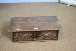 17th century oak Bible box of hinged rectangular form, the front with carved decoration and dated