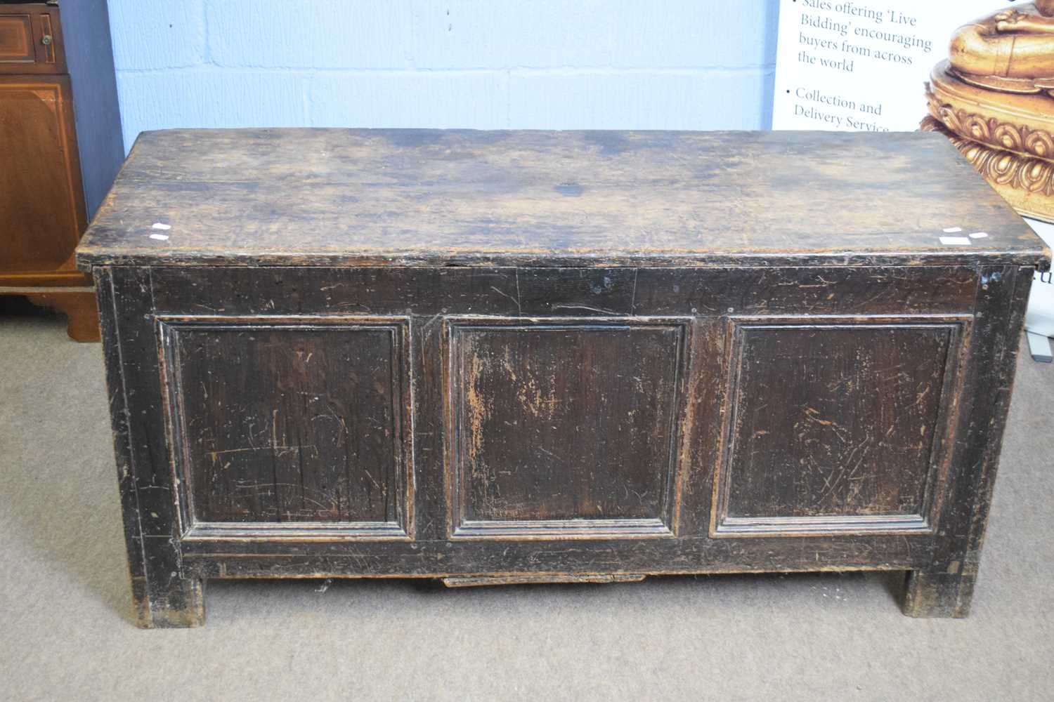 18th century oak coffer with board top over three panelled front raised on short stile feet, 134cm - Image 2 of 4
