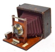 A SENECA UNO 4X5 CHATAUQUA FOLDING CAMERA