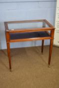 Early 20th century mahogany bijouterie table of hinged rectangular form with blue fabric linted