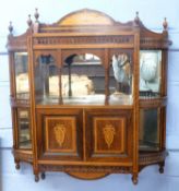 Late 19th century rosewood and inlaid wall cabinet with arched pediment and sunburst decoration, two