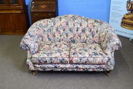 Lincoln House floral upholstered two-seater sofa with buttoned back and sides, 160cm wide