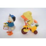 Clockwork model of a duck as a drummer, together with a further model of a bear on a tricycle (2)