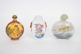 Small bag containing three Chinese scent bottles including a porcelain example with polychrome