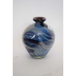 An Art Glass vase with a blue streaked design and signature to base, possibly Mdina