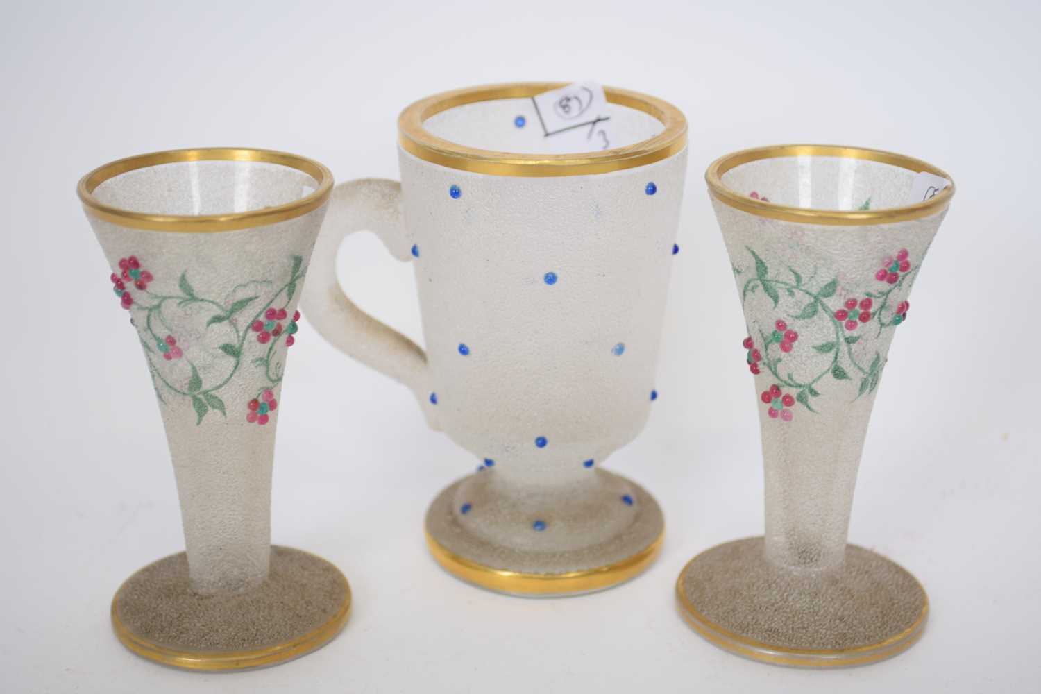 Pair of 19th century frosted glass vases with leaf and berry design, together with a further frosted