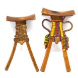 A Kenyan Pokot headrest with beaded decoration together with a similar plaited example (2)