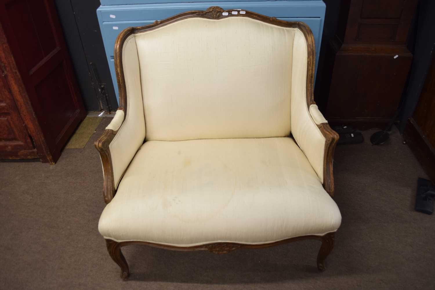 Late 19th/early 20th century Continental cherry wood framed parlour armchair upholstered in cream