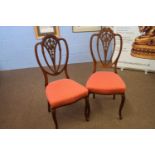 Pair of Edwardian mahogany framed side chairs with pierced back, red upholstered seats and cap front