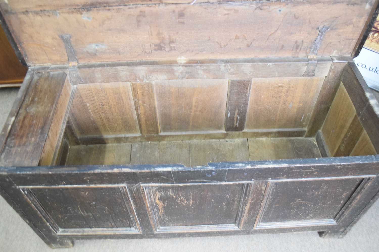 18th century oak coffer with board top over three panelled front raised on short stile feet, 134cm - Image 4 of 4