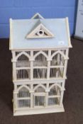 White painted wirework birdcage with sheet metal roof, 77cm high