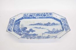 Chinese porcelain dish with blue and white design of a river scene, 39cm long (rim chips)