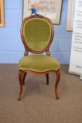 Single Victorian mahogany framed side chair with upholstered back and seat, raised on short cabriole