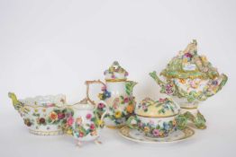 Group of porcelains, all with floral encrusted decoration including vase and cover, small basket,