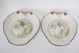 Pair of small Derby 19th century tureens of bombe form, with floral decoration, together with a pair