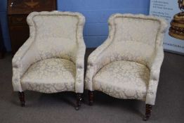 Pair of late Victorian floral upholstered armchairs with front turned legs, 85cm high