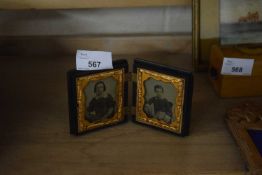 PAIR OF VINTAGE DAGUERROTYPE PHOTOGRAPHS IN FOLDING HINGED COMPOSITION FRAME