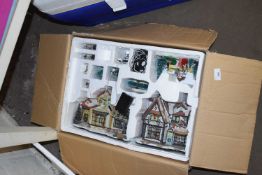 ONE BOX OF ILLUMINATED CHRISTMAS HOUSES AND DECORATIONS