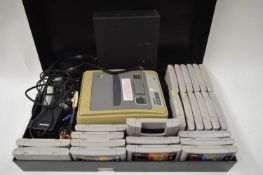 NINTENDO SUPER NINTENDO ENTERTAINMENT SYSTEM TOGETHER WITH A QUANTITY OF GAMES