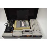 NINTENDO SUPER NINTENDO ENTERTAINMENT SYSTEM TOGETHER WITH A QUANTITY OF GAMES