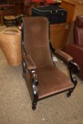 LATE 19TH CENTURY ARMCHAIR WITH EBONISED FRAME AND TURNED FRONT LEGS