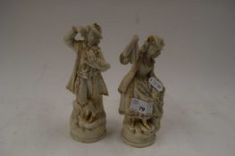 PAIR OF BISQUE PORCELAIN FIGURES IN CLASSICAL DRESS