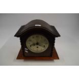 EARLY 20TH CENTURY MANTEL CLOCK IN OAK CASE WITH BARLEY TWIST DETAIL