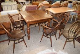 SET OF SIX DARK ERCOL FLEUR DE LIS BACKED DINING CHAIRS TOGETHER WITH A MID-CENTURY DRAW LEAF DINING