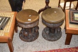 PAIR OF HARDWOOD STOOLS, THE BASES CARVED WITH ELEPHANTS