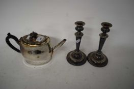 19TH CENTURY SILVER PLATE ON COPPER TEA POT TOGETHER WITH A FURTHER PAIR OF PLATED CANDLESTICKS (3)