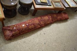 LARGE BOLSTER CUSHION DECORATED WITH PORTCULLIS FABRIC, APPROX 220CM LONG