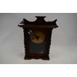 EARLY 20TH CENTURY MANTEL CLOCK WITH TURNED DECORATION TO CASE