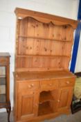 SMALL 20TH CENTURY PINE DRESSER, SHELVED BACK AND A BASE WITH THREE DRAWERS AND TWO DOORS, 115CM