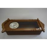 MODERN OAK CASED WALL CLOCK