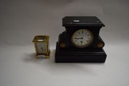 BAYARD BRASS CASED CARRIAGE CLOCK TOGETHER WITH A FURTHER MANTEL CLOCK IN EBONISED WOODEN CASE (2)