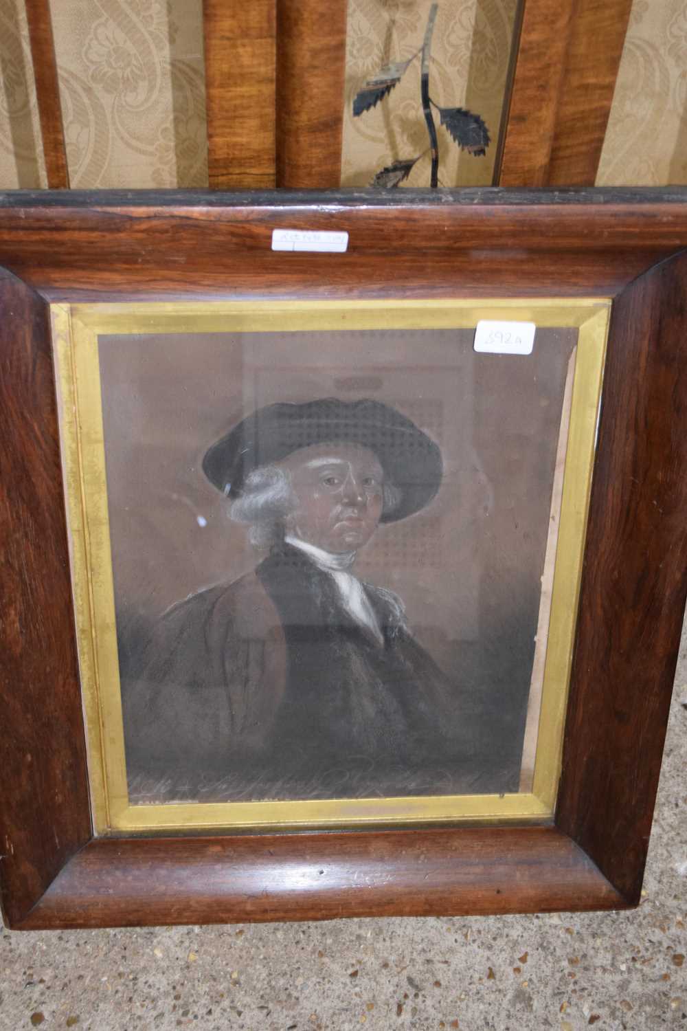 CHARCOAL AND CHALK PORTRAIT OF A GENTLEMAN IN A HAT