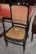 EARLY 20TH CENTURY CANE SEATED AND BACKED SIDE CHAIR