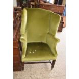 GEORGIAN STYLE GREEN UPHOLSTERED WING BACK ARMCHAIR (A/F)