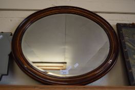 OVAL BEVELLED WALL MIRROR IN MAHOGANY FRAME