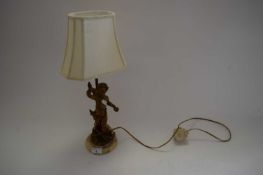 SMALL TABLE LAMP WITH COMPOSITION GILT PAINTED CHERUB DECORATION AND A CIRCULAR MARBLE BASE