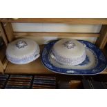 TWO 19TH CENTURY ENGLISH POTTERY CASSEROLE DISHES AND COVERS, TOGETHER WITH A DOULTON WATTEAU BLUE