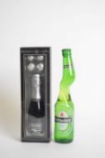 Boxed mini bottle of Prosecco and truffles, together with a novelty bottle of Heinekin Beer