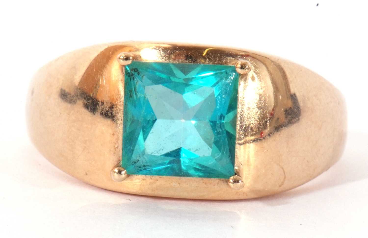 Modern 9ct gold blue zircon dress ring, the square cut zircon 8mm x 8mm, four claw set and raised