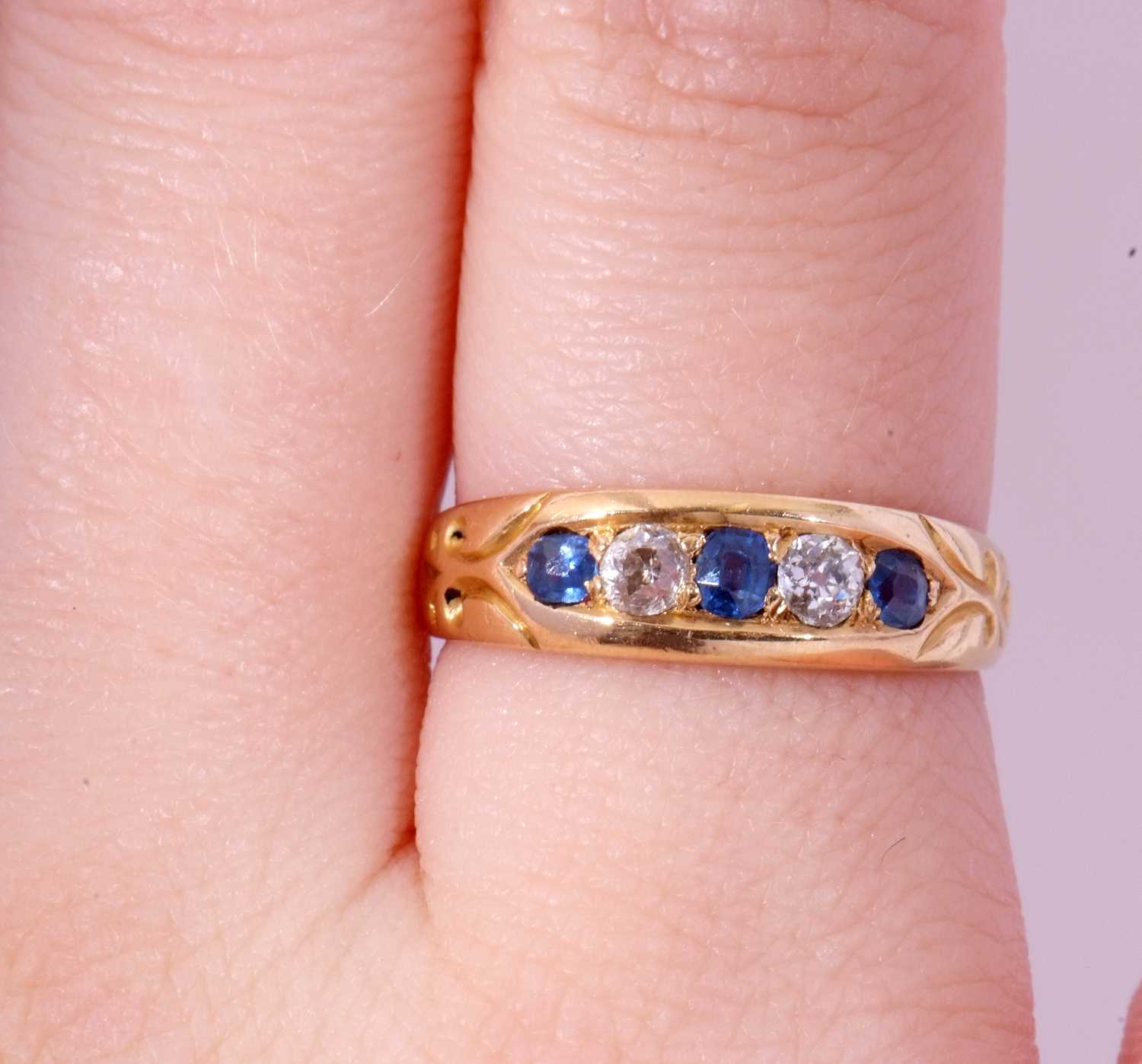 18ct gold sapphire and diamond ring, alternate set with three graduated sapphires and two round - Image 9 of 9